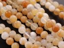 Yellow opal strand - spheres 6 mm shades of honey, length...