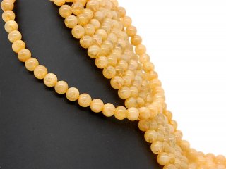 Billes de citrine percées en jaune