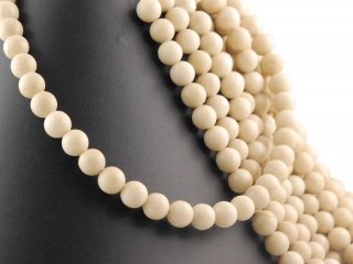 Pierced fossil stone spheres
