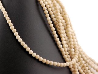 Pierced fossil stone spheres