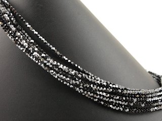 Shiny spheres of hematite in grey