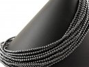 Shiny spheres of hematite in grey