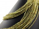 Peridot strand - faceted spheres 4 mm green, length 38 cm...