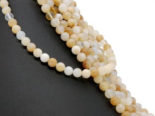 Boules percées en opale jaune