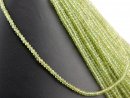 Peridot strand - faceted rondelle 2x3 mm grass green,...