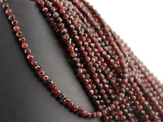 Faceted, pierced, red garnet beads