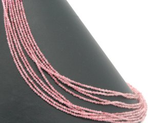 Petites boules de quartz rose facettées et percées