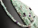 Pierced, faceted fluorite rondelles in blue and purple