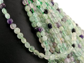 Pierced, faceted fluorite disc in blue and purple