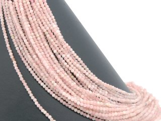 Pierced, pink-coloured morganite beads