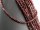 Faceted, pierced, red garnet discs