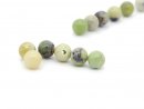 Six pierced green jasper beads
