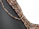 Faceted, pierced Pinkopal spheres in multicolour
