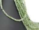 Green, pierced garnet spheres