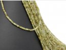 Green, faceted, pierced garnet rondelle