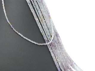 Pierced, faceted, coloured fluorite beads
