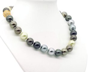 Necklace made of green-blue shell beads with glittering clasp