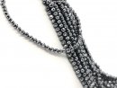 Faceted, pierced, dark grey gemstone beads