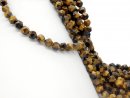 Tiger eye strand - roughly faceted 8x10 mm gold brown,...