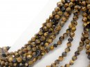 Tiger eye strand - roughly faceted 8x10 mm gold brown,...