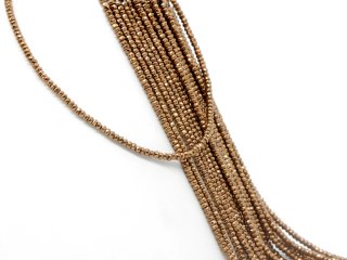 Petites rondelles dhématite percées et facettées de couleur brune
