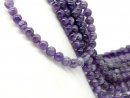 Amethyst strand - round 10 mm violet patterned, length...
