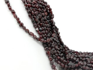 Faceted, pierced, red garnet nuggets