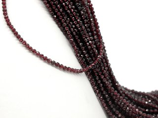 Faceted, pierced, red garnet beads