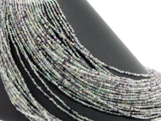 Pierced, faceted, coloured fluorite beads