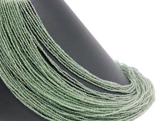 Apatite strand - faceted spheres 2 mm green, length 38.5 cm /5572