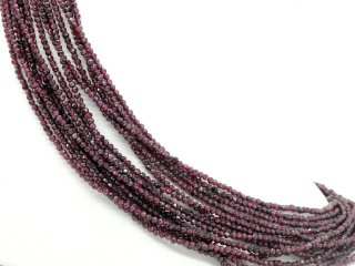 Red-violet, pierced garnet beads with facets
