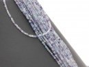 Pierced, faceted fluorite rondelles in blue and purple