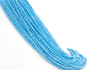 Faceted, pierced, blue howlite beads