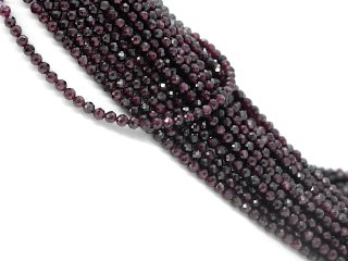 Faceted, pierced, red garnet beads