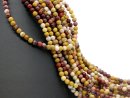 Colourful, drilled jasper beads