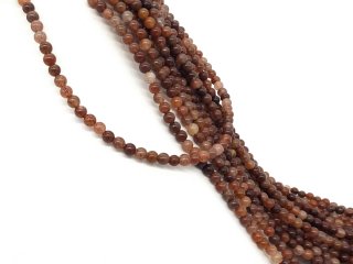 Durchbohrte, braunrote Aventurinkugeln