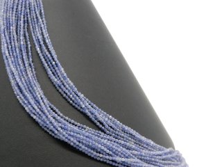 Small faceted tanzanite beads in purple