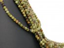 Perles de grenat vert facettées