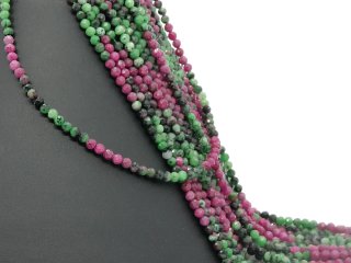 Faceted anyolite beads in magenta and green