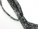 Small, faceted emerald beads