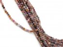Faceted, threaded ruby beads