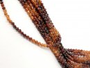 Faceted garnet beads in red and orange
