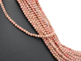 Petites perles de rhodochrosite