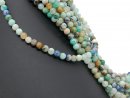 Pierced, colourful chrysoprase beads