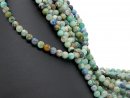 Pierced, colourful chrysoprase beads