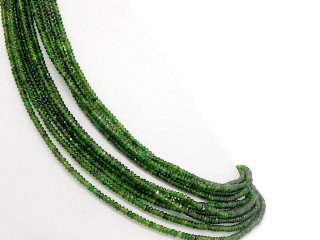 Pierced, intensely green diopside
