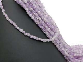 Boules dametrine violettes percées et facettées