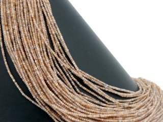 Faceted peach coloured moonstone rondelle