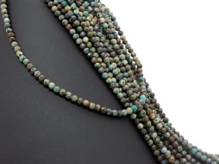 Small faceted turquoise beads in blue green and brown
