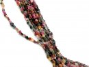 Pierced, colourful tourmaline pebbles